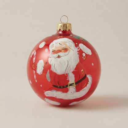 Palla di Natale Ø 10 cm dipinta a mano: Babbo Natale sotto la neve su fondo rosso