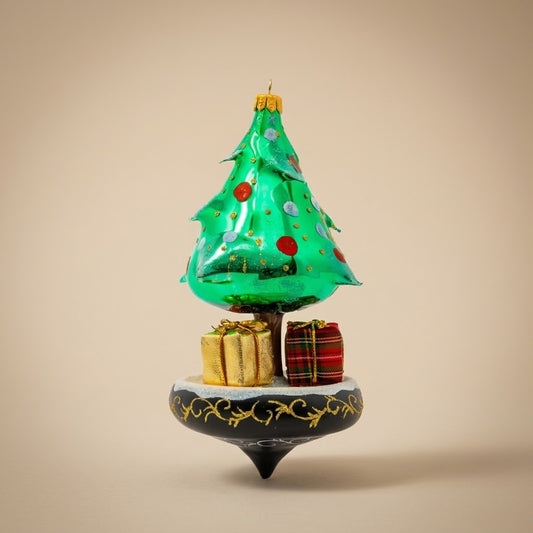 Christmas carousel ornament with tree and gifts, hand-painted