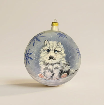 Hand-painted 6 in (15 cm) Christmas ornament: puppy in the snow with blue snowflakes