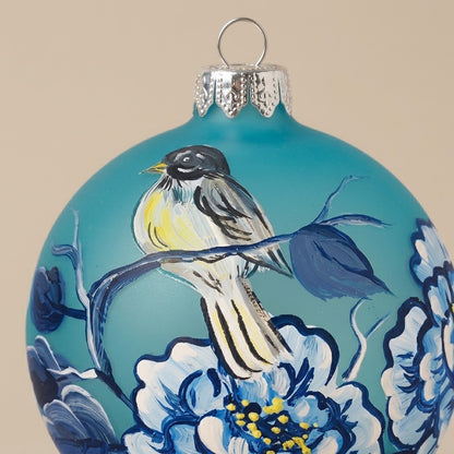 Ball bird and flowers on turquoise