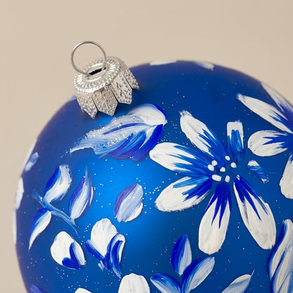 White flower ball on blue