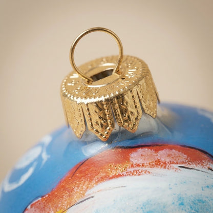 Lato e retro della palla di Natale in vetro soffiato