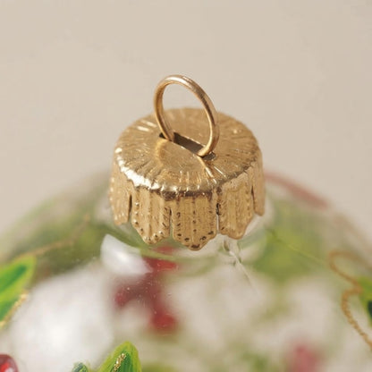 Lato e retro della palla di Natale in vetro soffiato