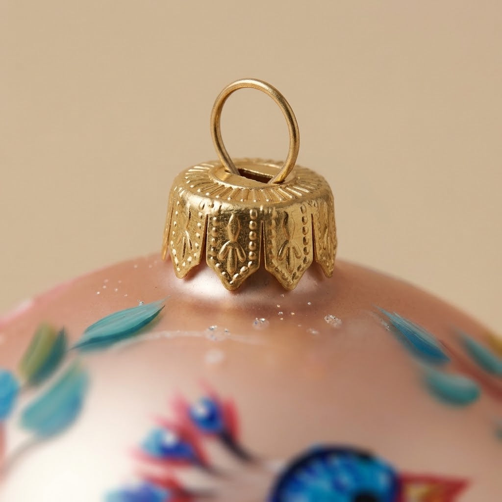 Multicolored bird ball and flowers on pink