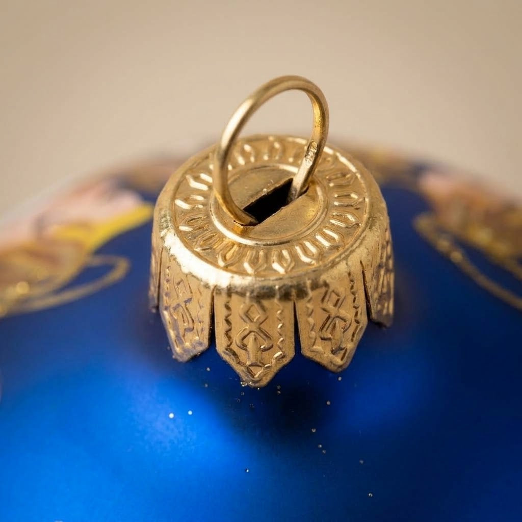 Lato e retro della palla di Natale in vetro soffiato