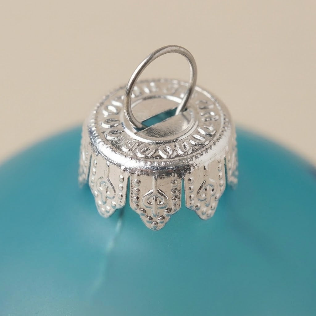 Ball bird and flowers on turquoise