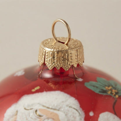 Lato e retro della palla di Natale in vetro soffiato