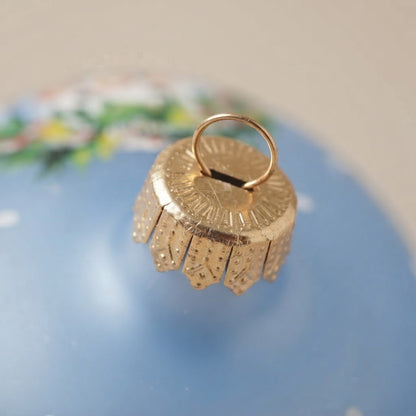 Lato e retro della palla di Natale in vetro soffiato