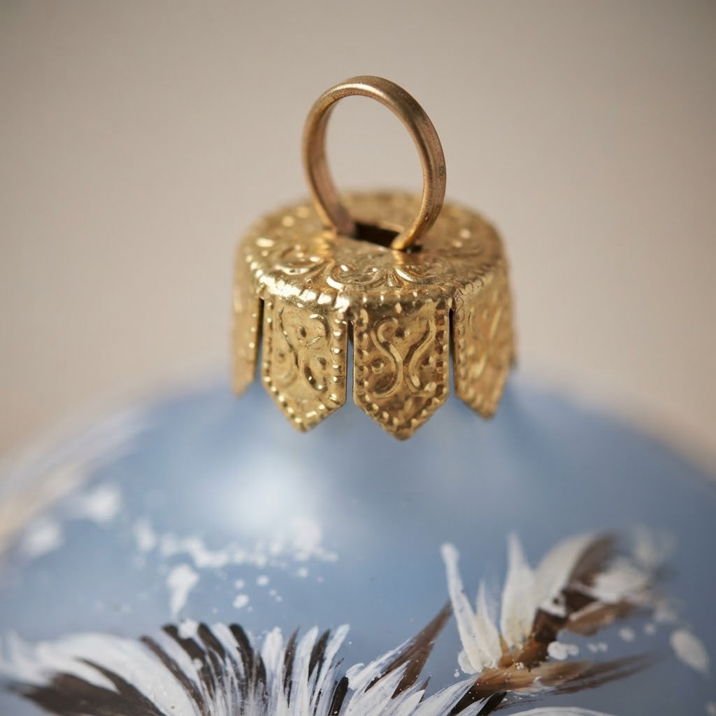 Lato e retro della palla di Natale in vetro soffiato