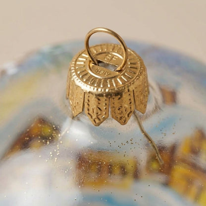 Lato e retro della palla di Natale in vetro soffiato