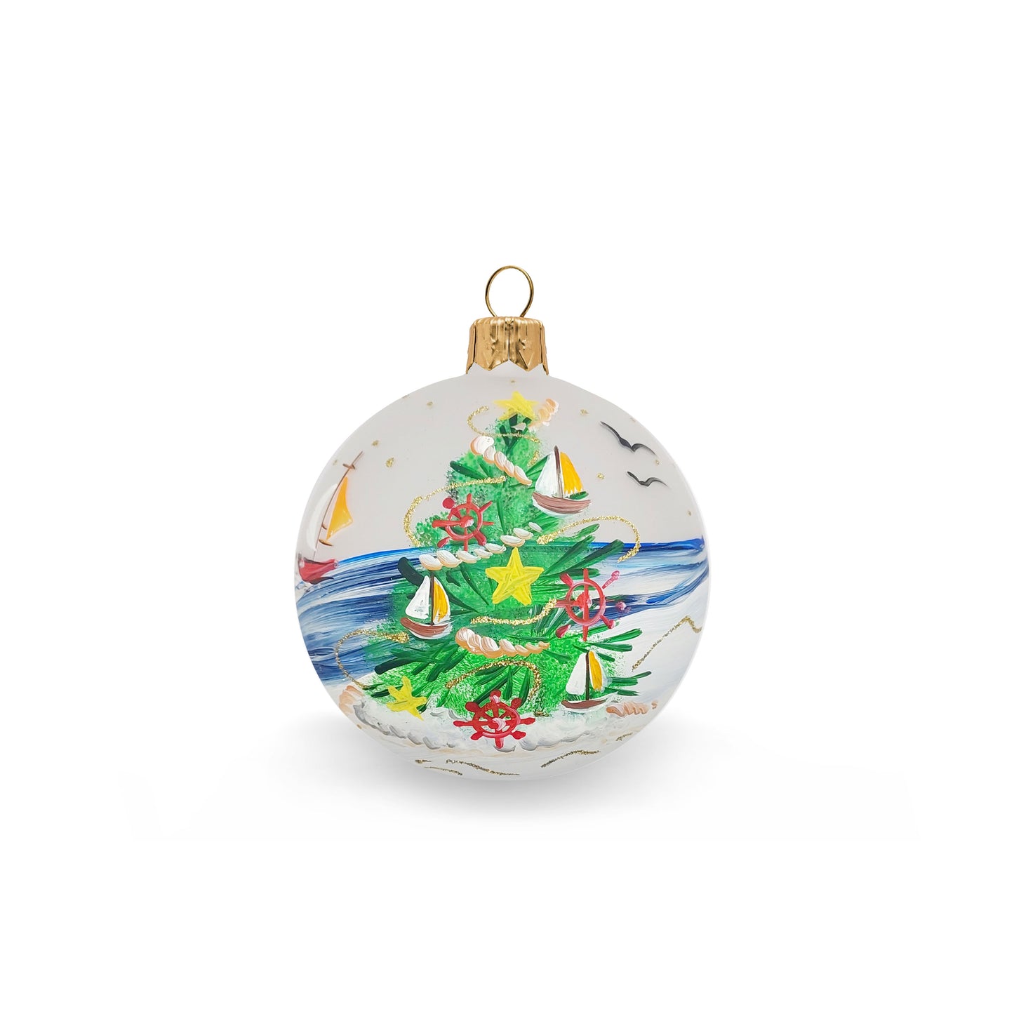 Christmas tree ball on the beach