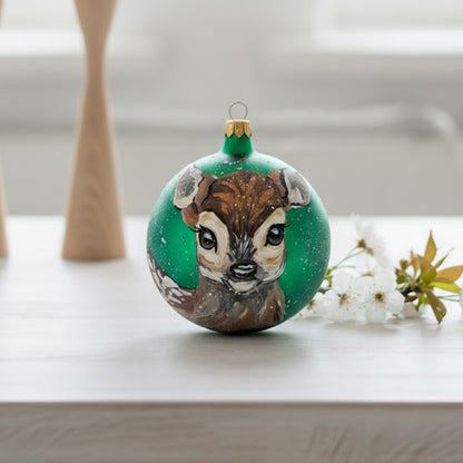 Hand-painted blown glass sphere Ø 100 mm with a deer on a bright green background