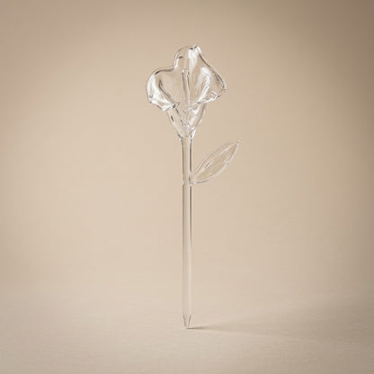 Clear glass calla lily with leaf and pointed stem, blown and shaped by hand in Bellagio