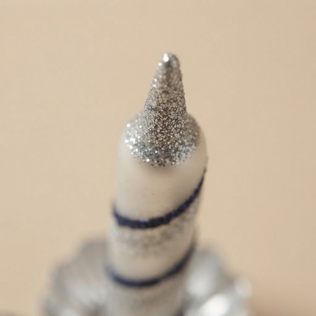 Dettaglio della punta in glitter argento