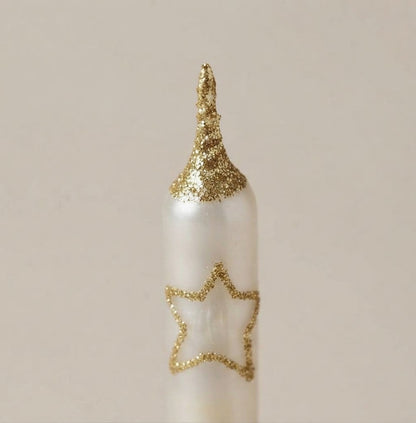 Close-up of the gold glitter star and golden tip