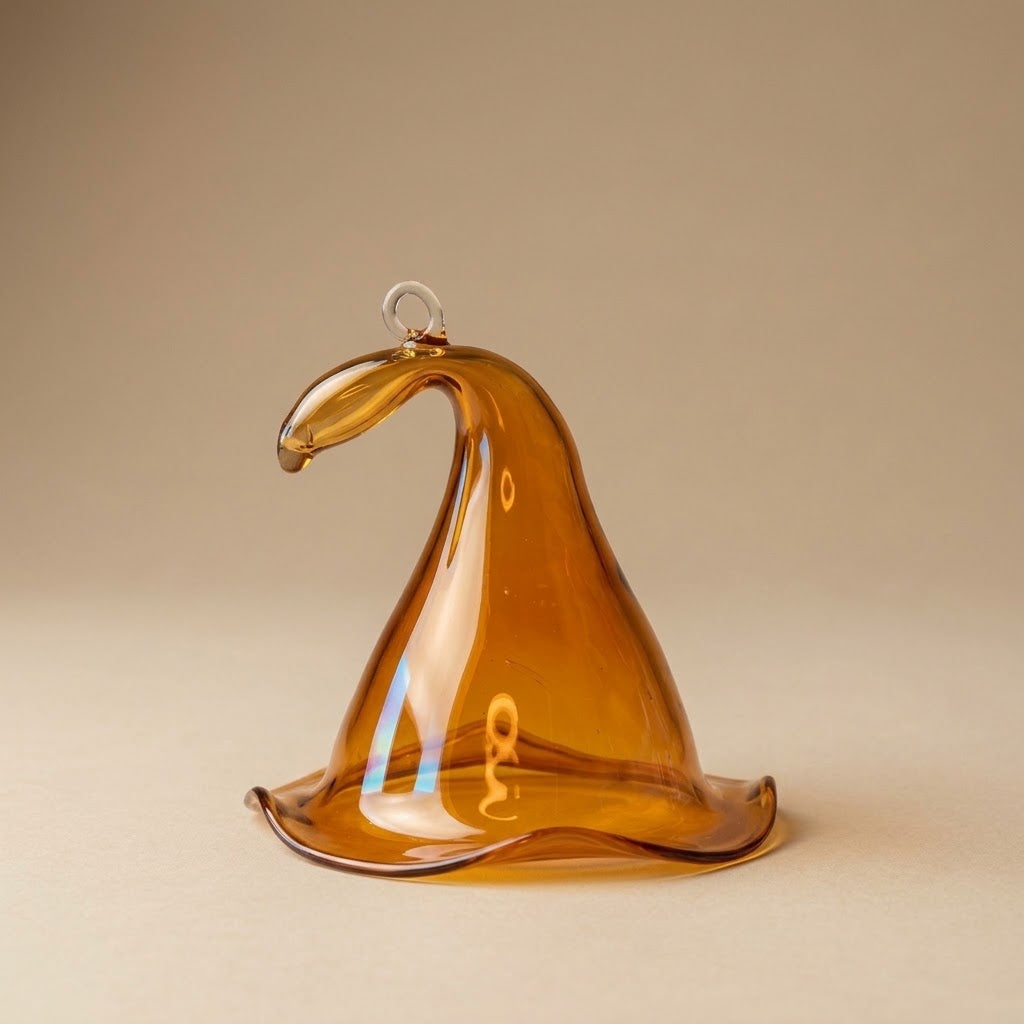 Amber glass witch hat with bent tip, side view