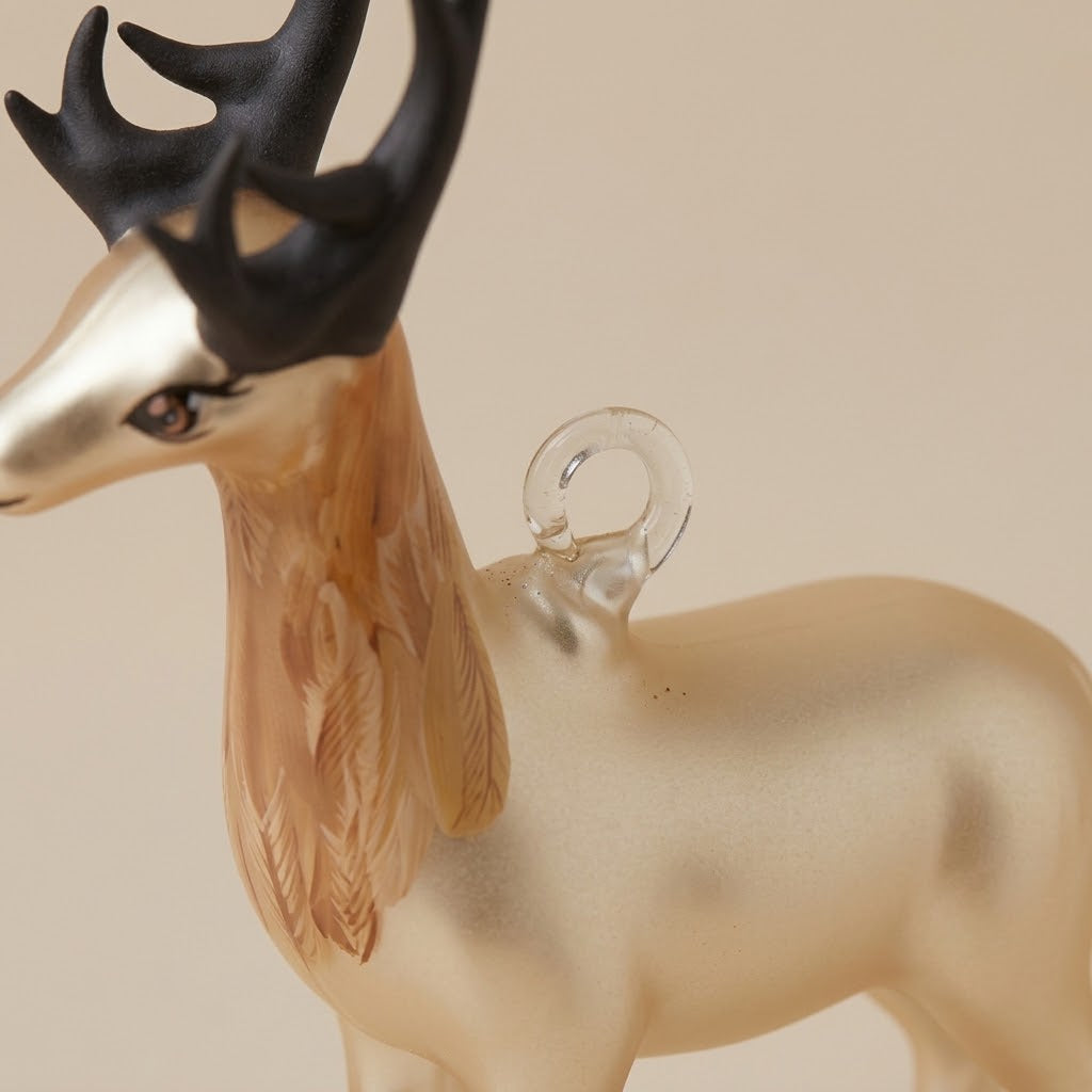 Clear glass hanging loop on the deer's back