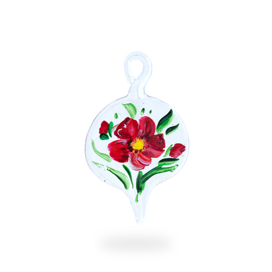 Flat transparent pendant with red flower