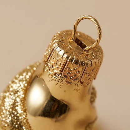 Cappuccio dorato del ghiacciolo di Natale oro