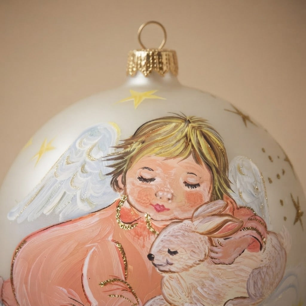 Close-up of the sleeping angel's face and the bunny