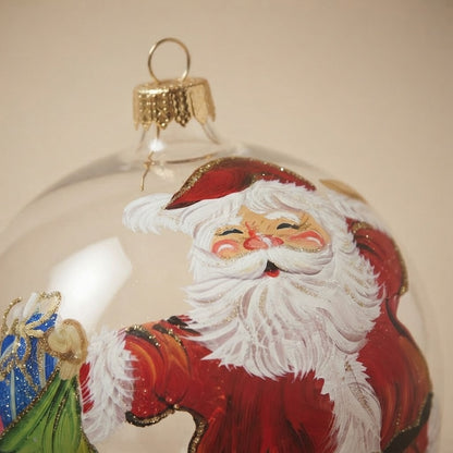 Dettaglio del decoro: palla di Natale Babbo Natale con il sacco su vetro trasparente, Ø 12 cm