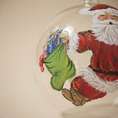Dettaglio ravvicinato: palla di Natale Babbo Natale con il sacco su vetro trasparente, Ø 12 cm