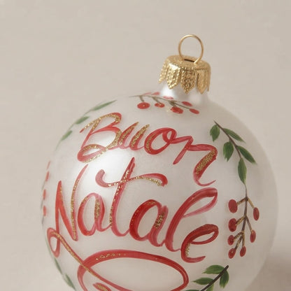 Dettaglio della scritta Buon Natale con glitter oro