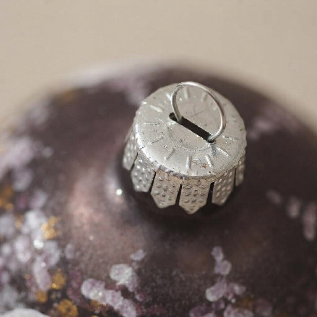 Close-up: Christmas ornament with a snowy house on plum, 4.7 in (12 cm)