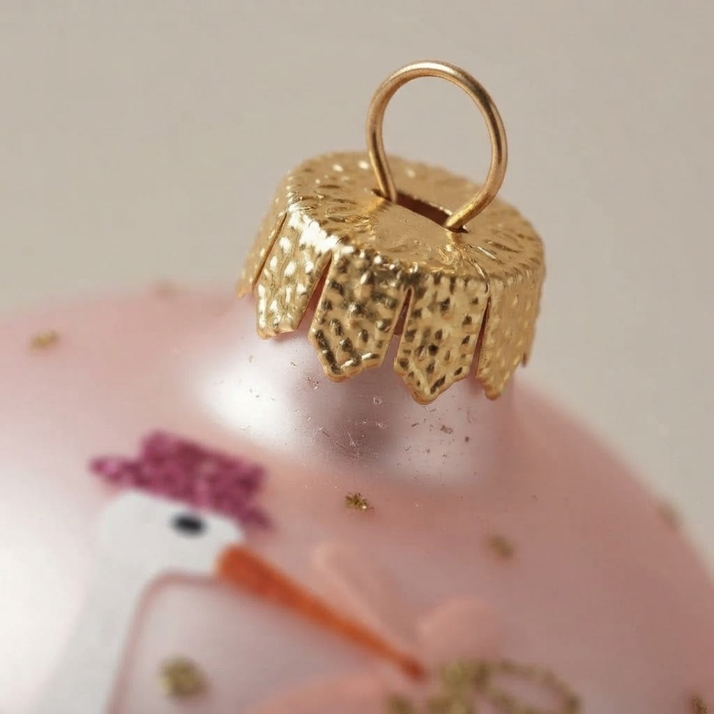 Cappuccio dorato della palla di Natale rosa in vetro soffiato