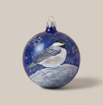 Christmas ornament with a chickadee on blue, 4 in (10 cm)