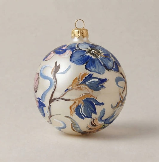 Hand-painted maiolica Christmas ornament, 4 in (10 cm): blue and pink flowers among twigs on a pearl white background