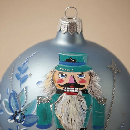 Detail of the mouth-blown, hand-painted glass Christmas ornament
