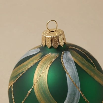 Detail of the mouth-blown, hand-painted glass Christmas ornament