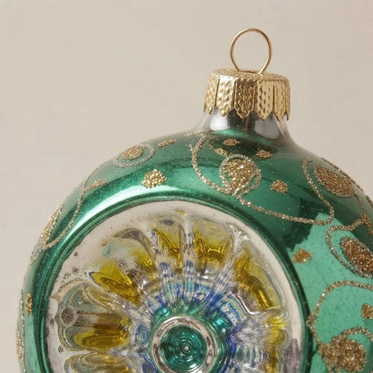 Dettaglio del decoro: palla di Natale verde e oro a riflettore, Ø 10 cm · Unica collection