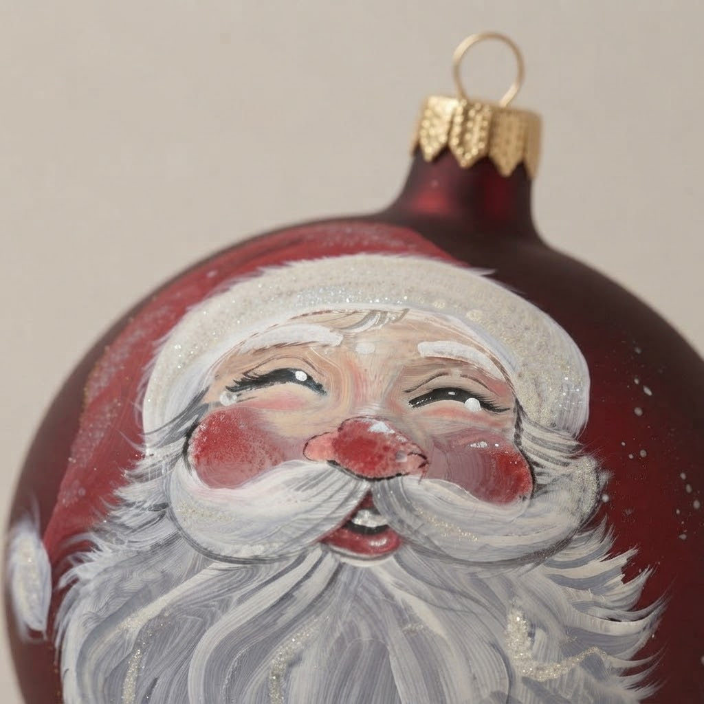 Detail of the mouth-blown, hand-painted glass Christmas ornament