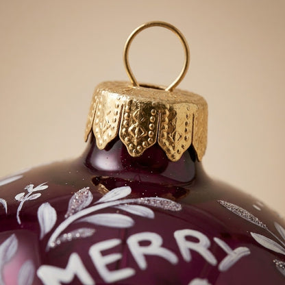 Particolare della palla di Natale in vetro soffiato dipinta a mano