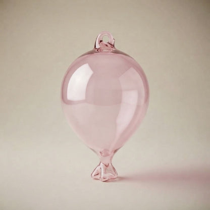 Light pink glass balloon ornament to hang
