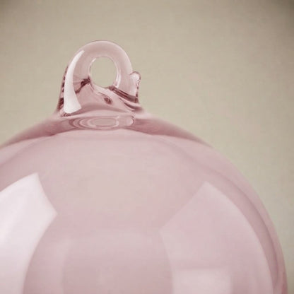 Light pink glass balloon ornament: close-up of the glass loop