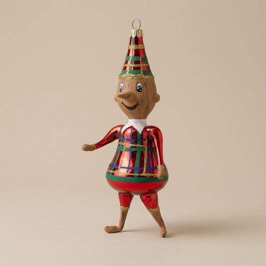 Glass Pinocchio ornament with red tartan jacket