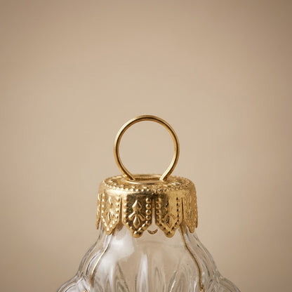 Close-up of the openwork gold cap on the glass star ornament