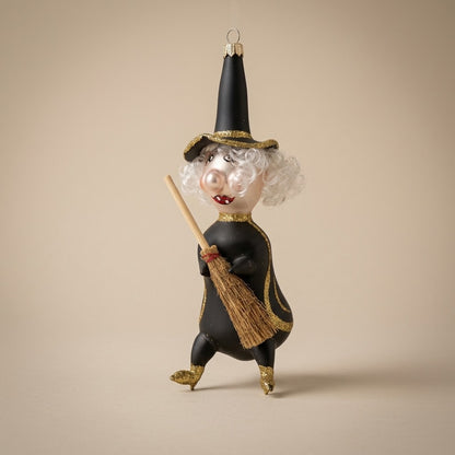 Black and gold glass witch Halloween ornament with straw broom