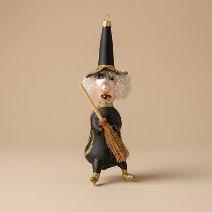 Black and gold Halloween witch, three-quarter view