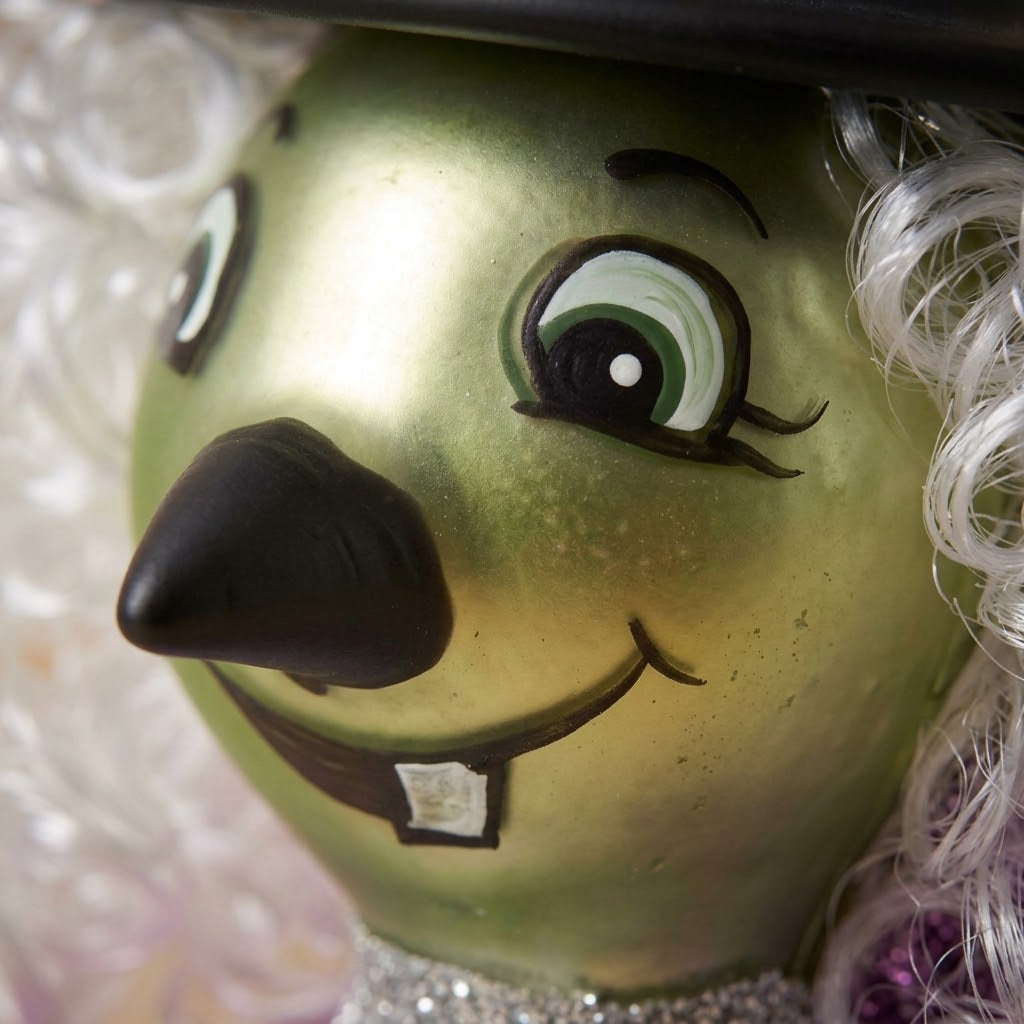 Detail of the Halloween witch's hand-painted face