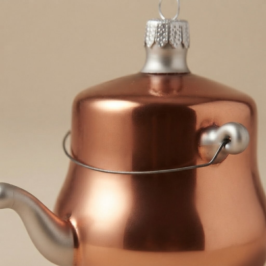 Decoration detail: Bronze teapot