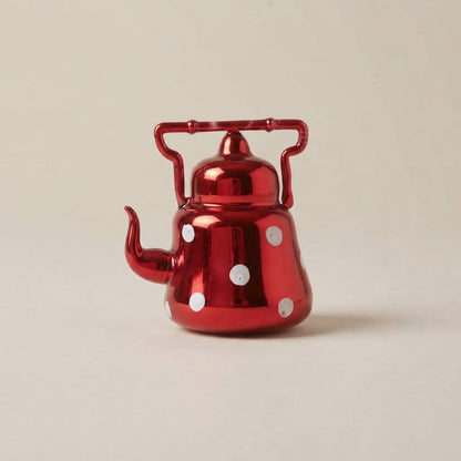 Teiera in vetro rosso a specchio con pois bianchi