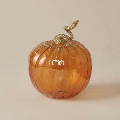 Zucca in vetro ambra con glitter oro vista di fronte