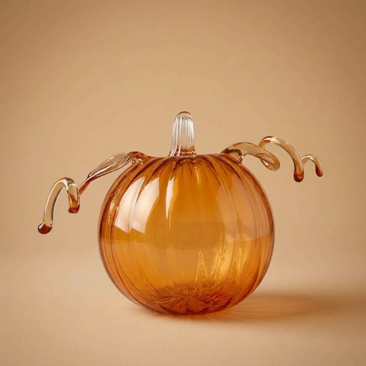 Zucca di Halloween in vetro soffiato ambra con viticci arricciati